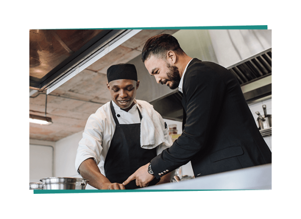 manager coaching restaurant employee