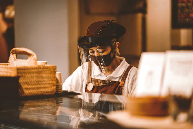 employee wearing a face shield